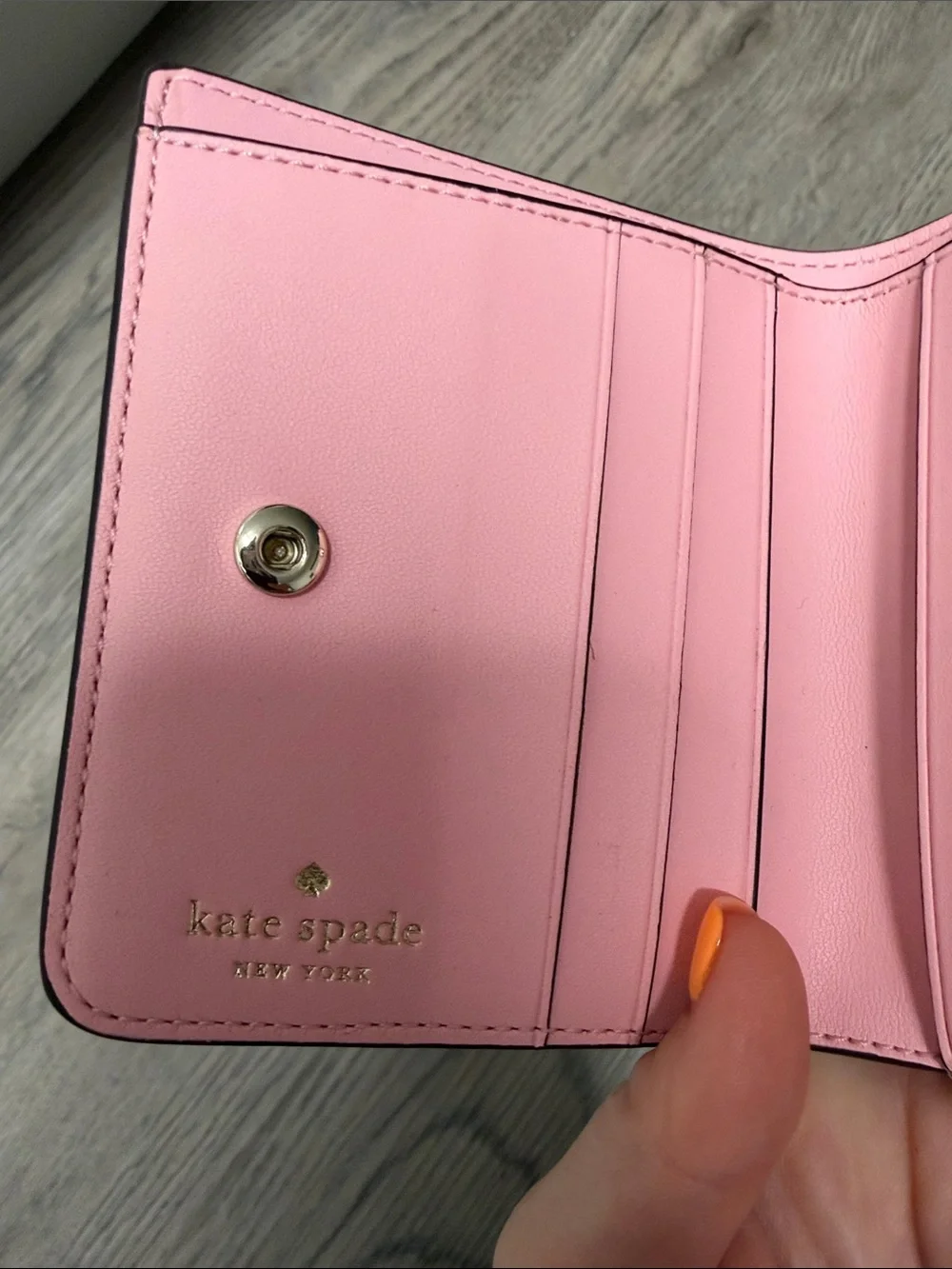 kate spade Pink Compact Zip Wallet with Gold Logo